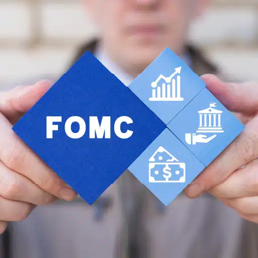 FOMC meeting represented by “FOMC” stamped on blocks.