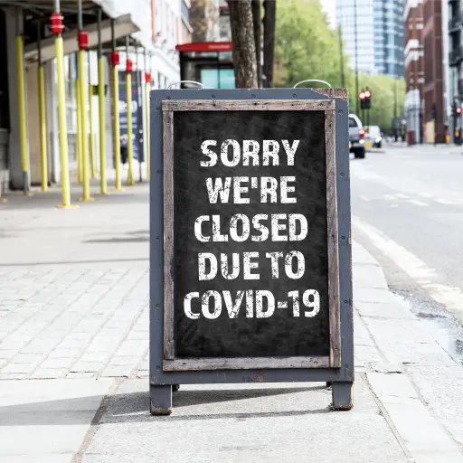 A business sign with the words “Sorry we’re closed due to COVID-19” that is meant represent businesses that need government assistance to weather the pandemic.