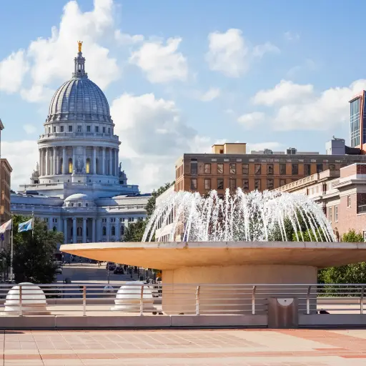 An image of the Wisconsin Capitol Building in Madison, WI. This is meant to represent state and local government and the impact of economic stimulus.